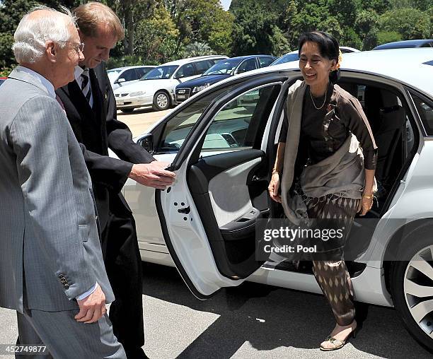 Nobel Peace Laureate and Myanmar opposition leader Aung San Suu Kyi is welcomed by Govenor of Victoria Alex Chernov at the launch of the AIDS 2014...