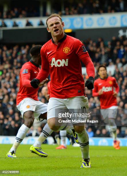 Wayne Rooney of Manchester United celebrates scoring their second goal from the penalty spot during the Barclays Premier League Match between...