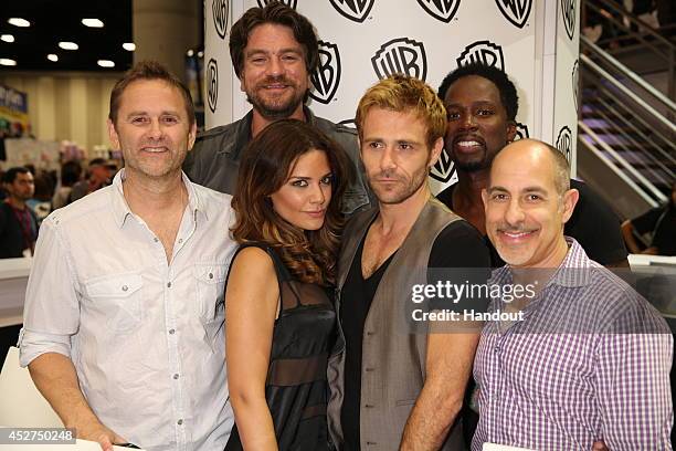 In this handout photo provided by Warner Bros, Daniel Cerone, Charles Halford, Angélica Celaya, Matt Ryan, Harold Perrineau, and David S. Goyer of...