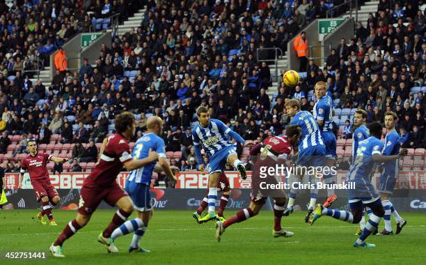 Craig Bryson of Derby County scores the opening goal during the Sky Bet Championship match between Wigan Athletic and Derby County at DW Stadium on...