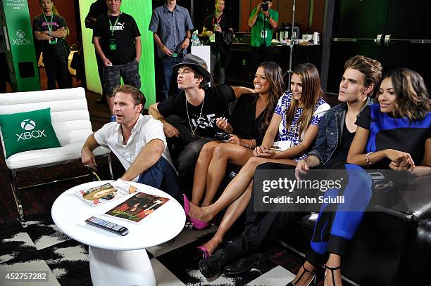 The Vampire Diaries' actors Matthew Davis, Ian Somerhalder, TV personality Rocsi, actors Nina Dobrev, Paul Wesley and Kat Graham chat with fans over...