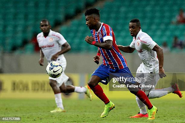 Rhayner of Bahia battles for the ball during the match between Bahia and Internacional as part of Brasileirao Series A 2014 at Arena Fonte Nova on...