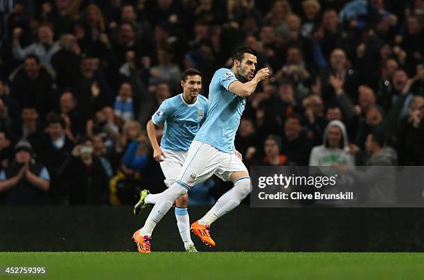 Alvaro Negredo of Manchester City celebrates scoring the opening goal during the Barclays Premier League match between Manchester City and Swansea...