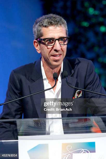 Honoree Jason Flom speaks on stage at the 15th annual Art for Life Gala hosted by Russell and Danny Simmons at Fairview Farms on July 26, 2014 in...