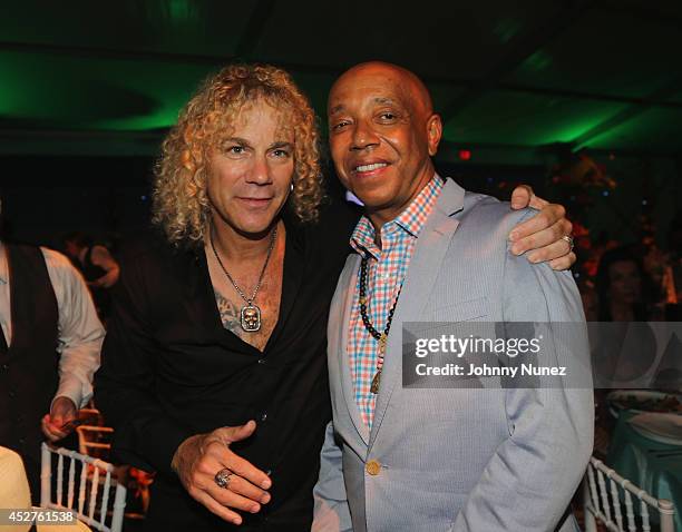 David Bryan of Bon Jovi and Co-Founder, Rush Philanthropic Arts Foundation Russell Simmons attend the 15th annual Art for Life Gala hosted by Russell...