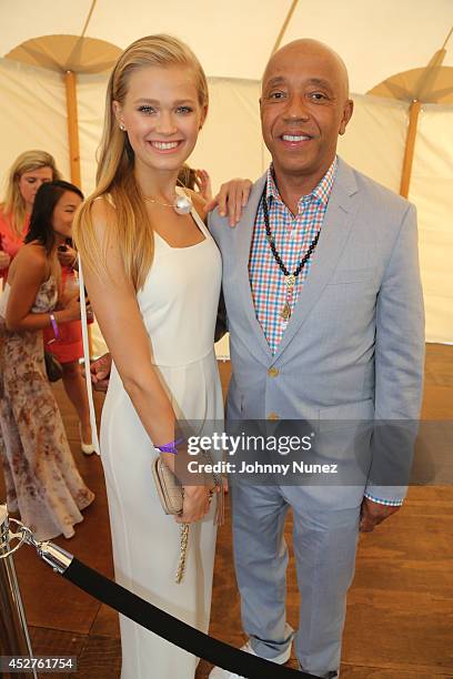 Model Vita Sidorkina and co-founder of the Rush Philanthropic Arts Foundation Russell Simmons attend the 15th annual Art for Life Gala hosted by...