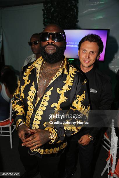 Rapper Rick Ross and television personality Jonathan Cheban attend the 15th annual Art for Life Gala hosted by Russell and Danny Simmons at Fairview...