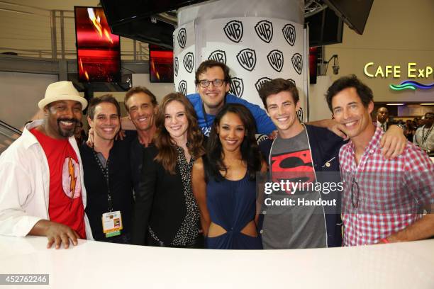 In this handout photo provided by Warner Bros, Jesse L. Martin, Greg Berlanti, John Wesley Shipp, Danielle Panabaker, Andrew Kreisberg, Candice...