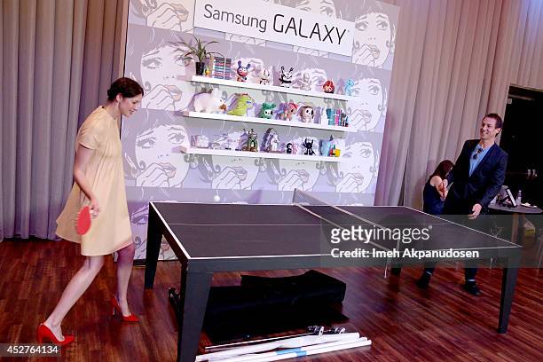 Actors Caitriona Balfe and Tobias Menzies attend the Samsung Galaxy VIP Lounge at Comic-Con International 2014 at Hard Rock Hotel San Diego on July...