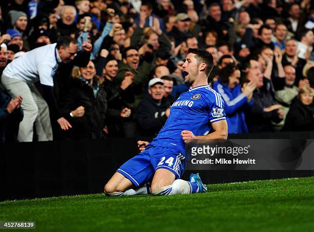 Gary Cahill of Chelsea celebrates as he scores their first goal during the Barclays Premier League match between Chelsea and Southampton at Stamford...