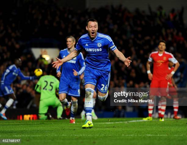 John Terry of Chelsea celebrates as he scores their second goal with a header during the Barclays Premier League match between Chelsea and...