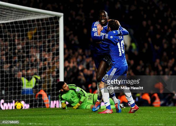 Despair for Paulo Gazzaniga of Southampton as Demba Ba of Chelsea celebrates with Juan Mata as he scores their third goal during the Barclays Premier...