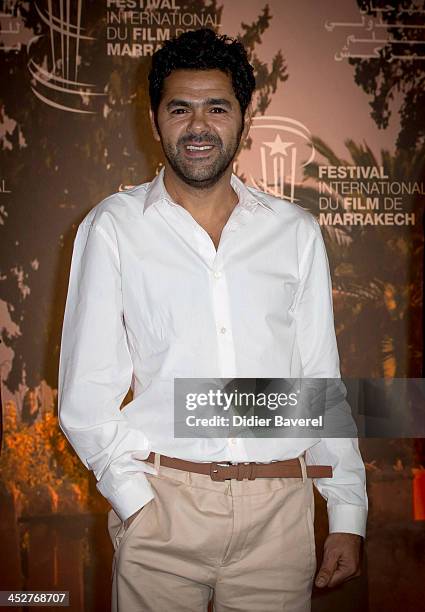 Jamel Debbouze poses during the photocall of 'La Marche'at 13th Marrakech International Film Festival on December 1, 2013 in Marrakech, Morocco.