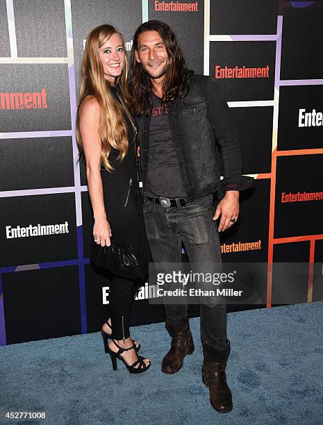 Actor Zach McGowan and his wife Emily McGowan attend Entertainment Weekly's annual Comic-Con celebration at Float at Hard Rock Hotel San Diego on...