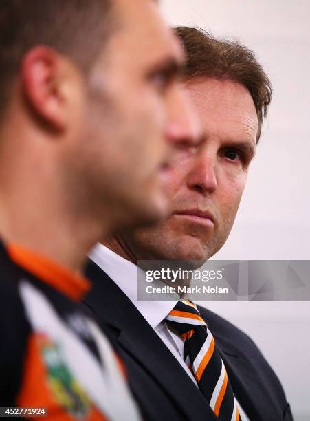 Mick Potter and Robbie Farah of the Tigers talk to the media after the round 20 NRL match between the Wests Tigers and the St George Illawarra...