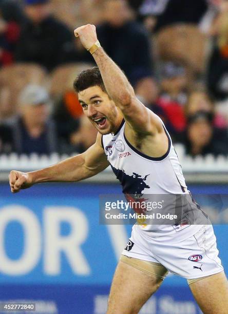 Taylor Walker of the Crows celebrates a goal during the round 18 AFL match between the Collingwood Magpies and the Adelaide Crows at Melbourne...