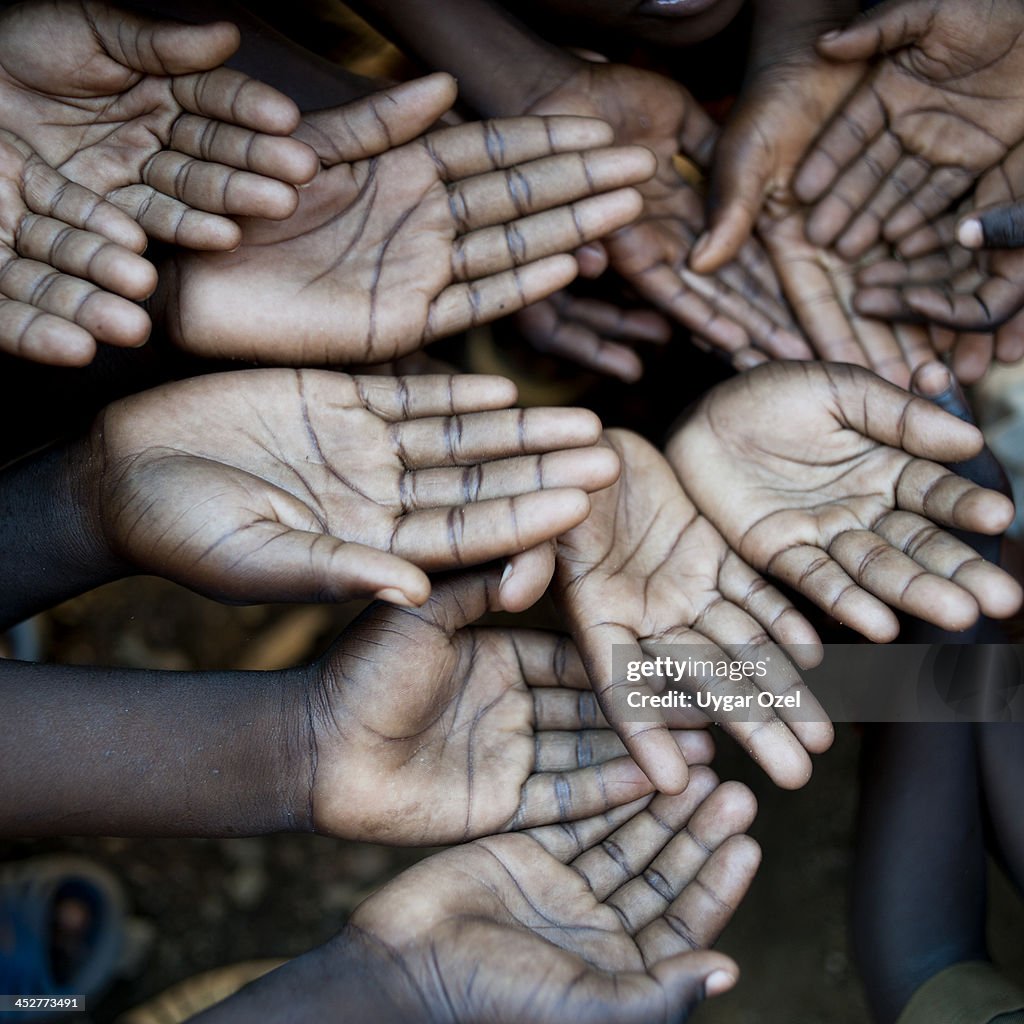 Hands of African children, need help.