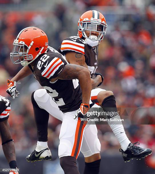 Cornerback Buster Skrine and Joe Haden of the Cleveland Browns celebrate after an interception against the Jacksonville Jaguars at FirstEnergy...