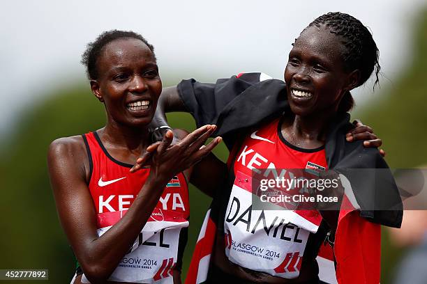 Flomena Cheyech Daniel and Caroline Kilel of Kenya celebrate together after they finish first and second in the Women's Marathon on the city marathon...