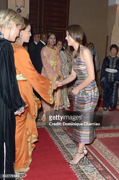 Actress and Jury Member Marion Cotillard is greeted by Princess Lalla Meryem of Morocco and Melita Toscan du Plantier as she attends the Royal Gala...
