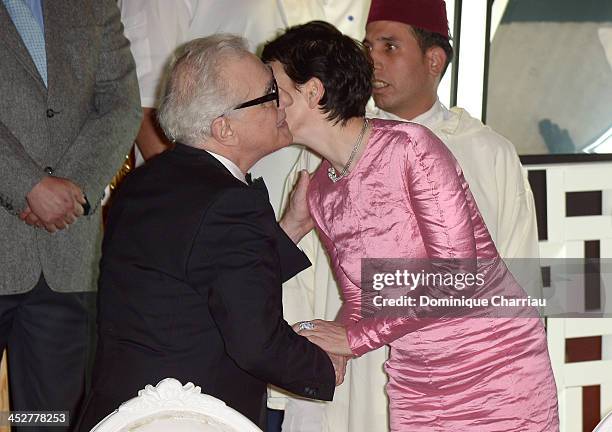 Director and Jury President Martin Scorsese greets actress Juliette Binoche as they attend the Royal Gala Dinner during the 13th Marrakesh...