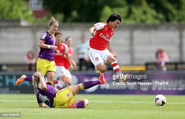 Shinobu Ohno of Arsenal skips over the challenge from Sophie Walton of Notts COuntyduring the WSL match between Arsenal Ladies and Notts County at...