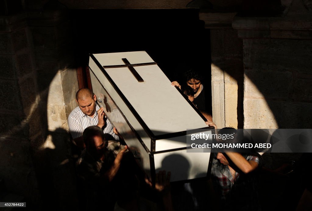 TOPSHOT-PALESTINIAN-ISRAEL-CONFLICT-FUNERAL