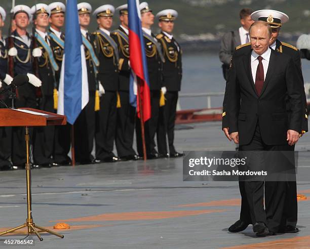 Russian President Vladimir Putin attends a Navy Day Military parade July 27, 2014 in Severomorsk. Putin is having a visit to Northern Fleet main...