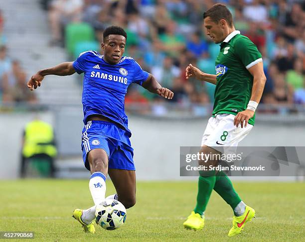 Nathaniel Chalobah of Chelsea comets for the ball against Darijan Matic of FC Olimpija Ljubljana during the Pre Season Friendly match between FC...