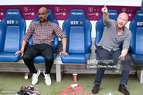 Head coach Pep Guardiola and Matthias Sammer of Munich after the Telekom Cup 2014 Finale match between FC Bayern Muenchen and Borussia...