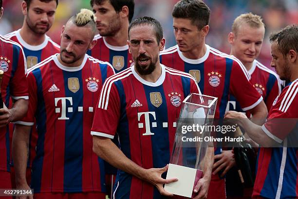 Frank Ribery of Munich with the trophy after the Telekom Cup 2014 Finale match between FC Bayern Muenchen and Borussia Moenchengladbach at Imtech...