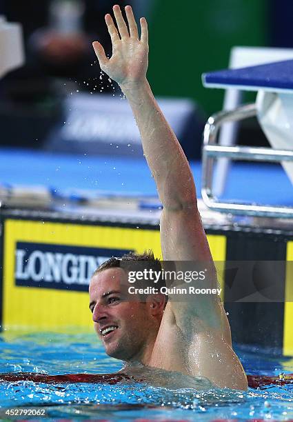 James Magnussen of Australia celebrates winning the gold medal in the Men's 100m Freestyle Final at Tollcross International Swimming Centre during...
