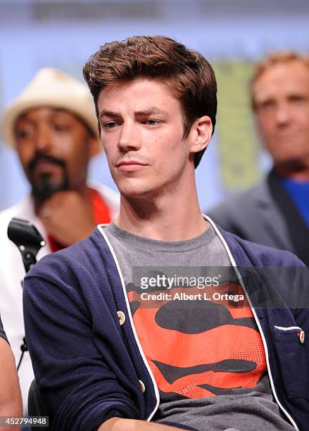 Actor Grant Gustin attends Warner Bros. Television & DC Entertainment world premiere presentation during Comic-Con International 2014 at San Diego...