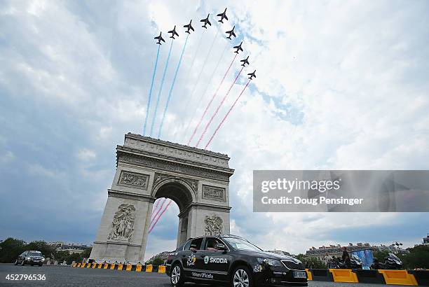 Jets perform a fly past above L'Arc de Triomphe during the twenty first stage of the 2014 Tour de France, a 138km stage from Evry into the...