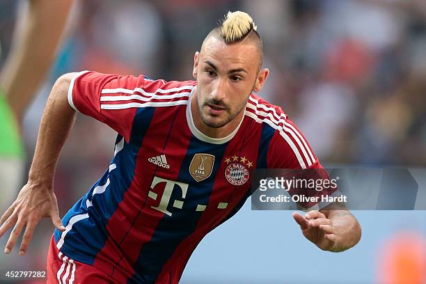 Diego Contento of Munich during the Telekom Cup 2014 Finale match between FC Bayern Muenchen and VfL Wolfsburg at Imtech Arena on July 27, 2014 in...