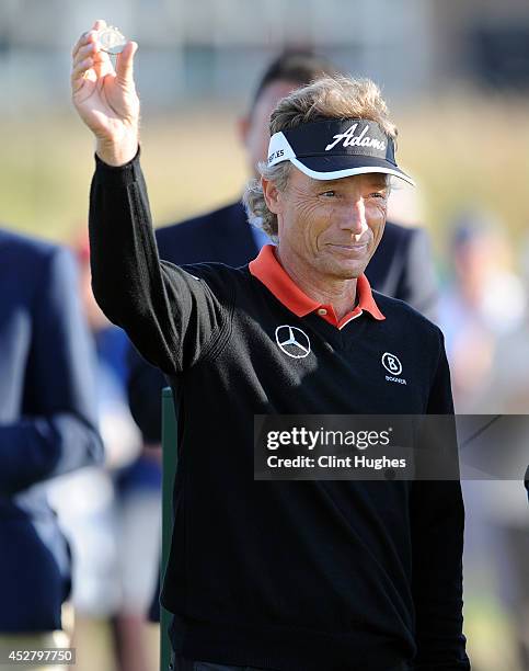 Bernhard Langer of Germany holds his winners medal up after his victory during the fourth round of the Senior Open Championship at Royal Porthcawl...