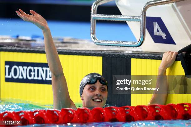 Francesca Halsall of England celebrates winning the gold medal in the Women's 50m Butterfly Final at Tollcross International Swimming Centre during...