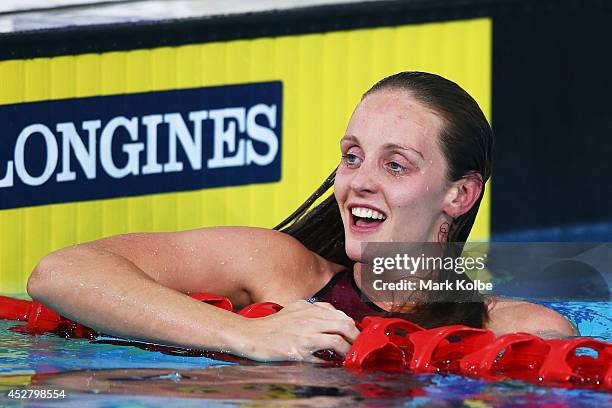 Francesca Halsall of England celebrates winning the gold medal in the Women's 50m Butterfly Final at Tollcross International Swimming Centre during...