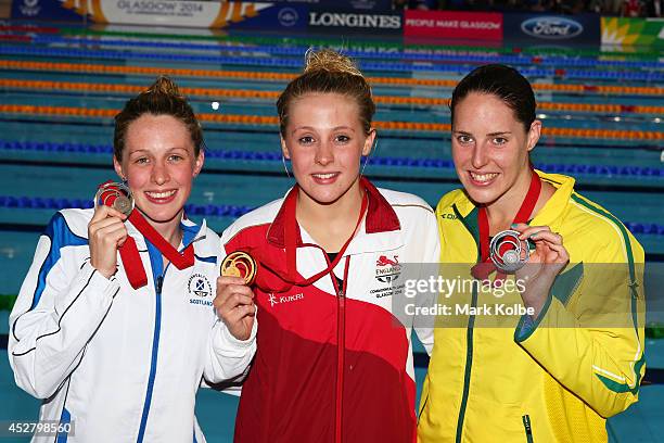 Gold medallist Siobhan O'Connor of England poses with silver medallist Alicia Coutts of Australia and bronze medallist Hannah Miley of Scotland after...