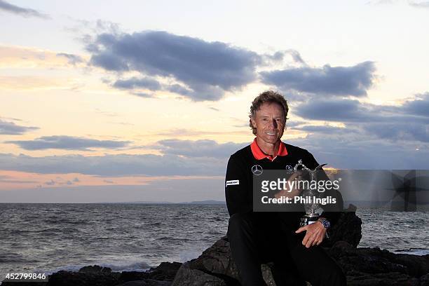 Bernhard Langer of Germany poses with the trophy after the final round of the Senior Open Championship played at Royal Porthcawl Golf Club on July...