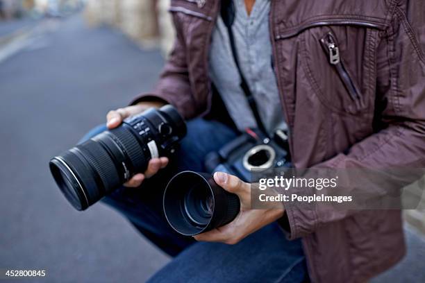 änderung auf die korrekte gläser - professional photographer stock-fotos und bilder