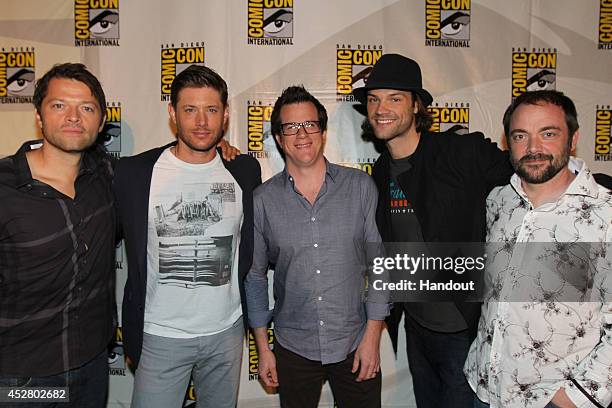 In this handout photo provided by Warner Bros, Misha Collins, Jensen Ackles, Jeremy Carver, Jared Padalecki and Mark A. Sheppard of "Supernatural"...