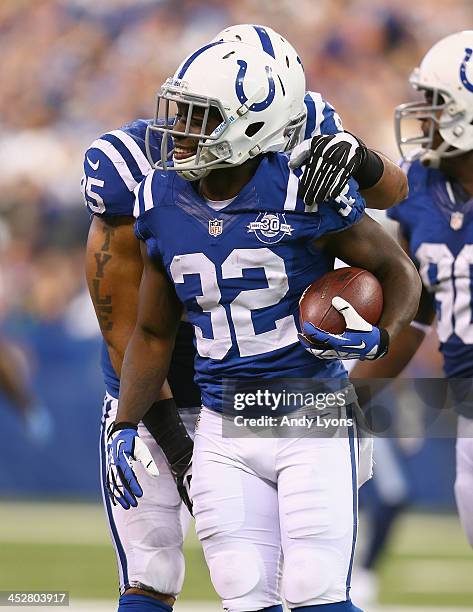 Cassius Vaughn of the Indianapolis Colts celebrates after intercepting a pass during the NFL game against the Tennessee Titans at Lucas Oil Stadium...