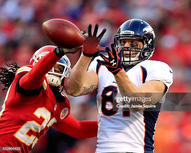 Free safety Kendrick Lewis of the Kansas City Chiefs breaks up a pass intended for tight end Joel Dreessen of the Denver Broncos during the game at...