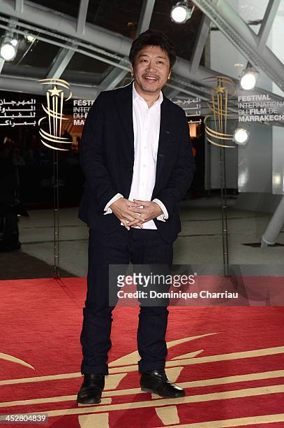Director Kore-Eda Hirokazu attends the 'Like Father, Like Son' premiere during the 13th Marrakech International Film Festival on December 1, 2013 in...
