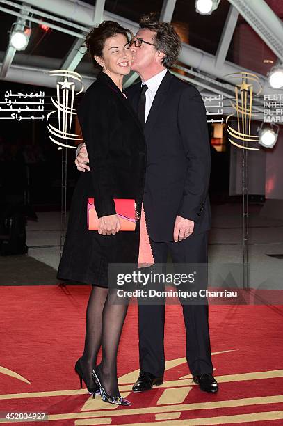 Actor Francois Cluzet and his wife Narjiss attend the 'Like Father, Like Son' premiere during the 13th Marrakech International Film Festival on...