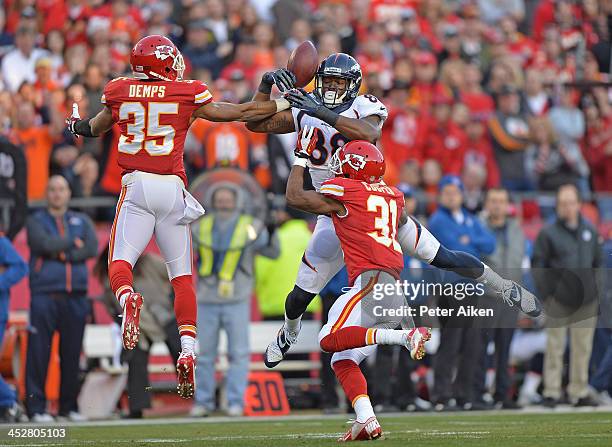 Safety Quintin Demps of the Kansas City Chiefs intercepts a deflected pass intended for wide receiver Demaryius Thomas of the Denver Broncos during...