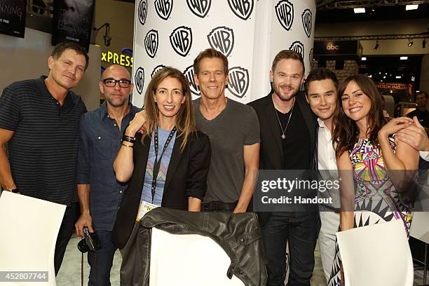 In this handout photo provided by Warner Bros, Kevin Williamson, Marcos Siega and Jennifer Johnson with series stars Kevin Bacon, Shawn Ashmore, Sam...