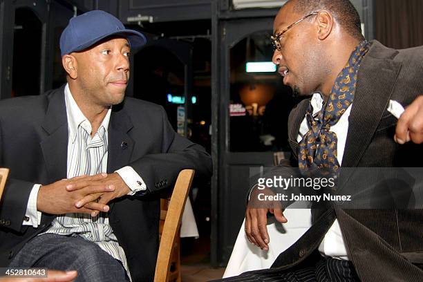 Russell Simmons and Andre Harrell during Sean P. Diddy Combs' Surprise 35th Birthday Party at Figa in New York City, New York, United States.