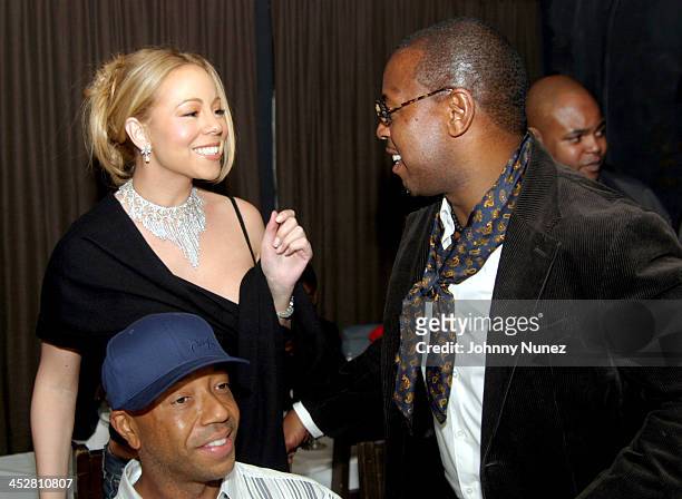 Mariah Carey, Russell Simmons and Andre Harrell during Sean P. Diddy Combs' Surprise 35th Birthday Party at Figa in New York City, New York, United...